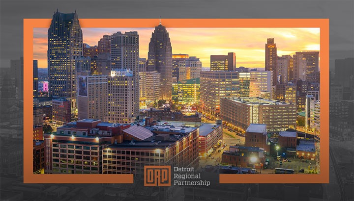 Detroit Skyline At Night With Orange Border And Detroit Regional Partnership Logo