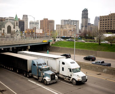 Big Rigs frequent the highways in and around Detroit Michigan in a horizontal composition