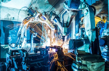 Robots Welding In A Car Factory