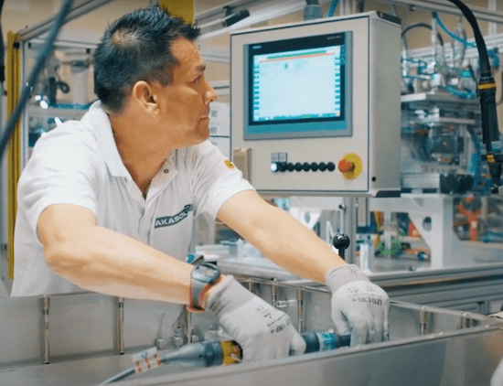 Person working on high-performance batteries at AKASOL