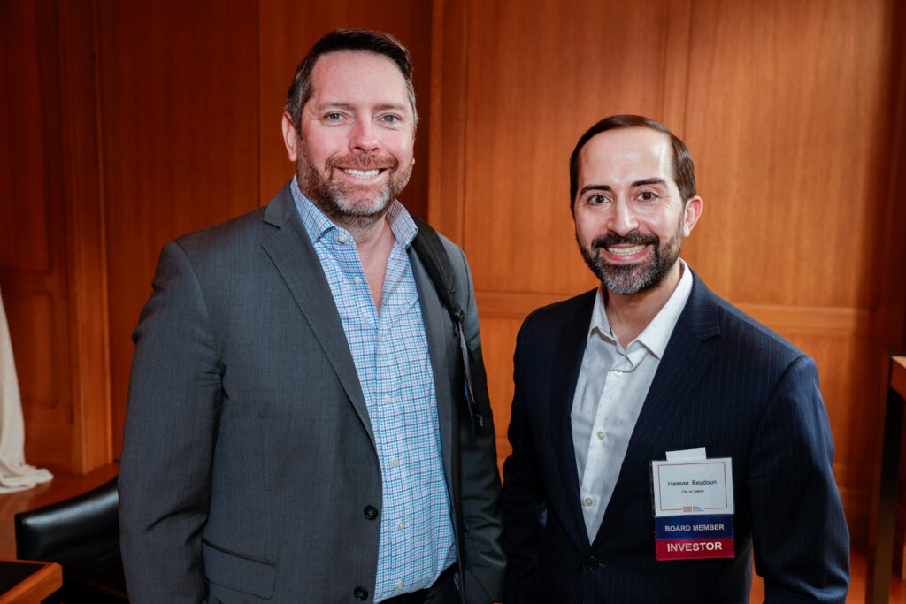 Two people standing next to each other