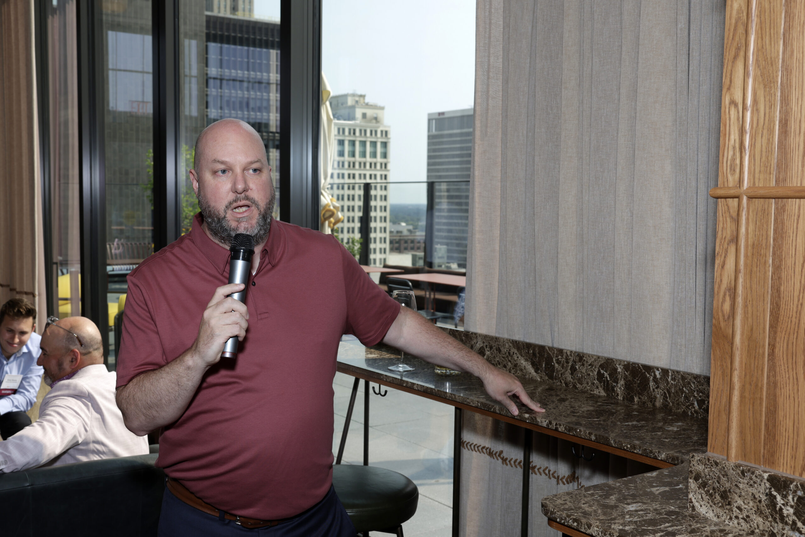 Person talking into a microphone