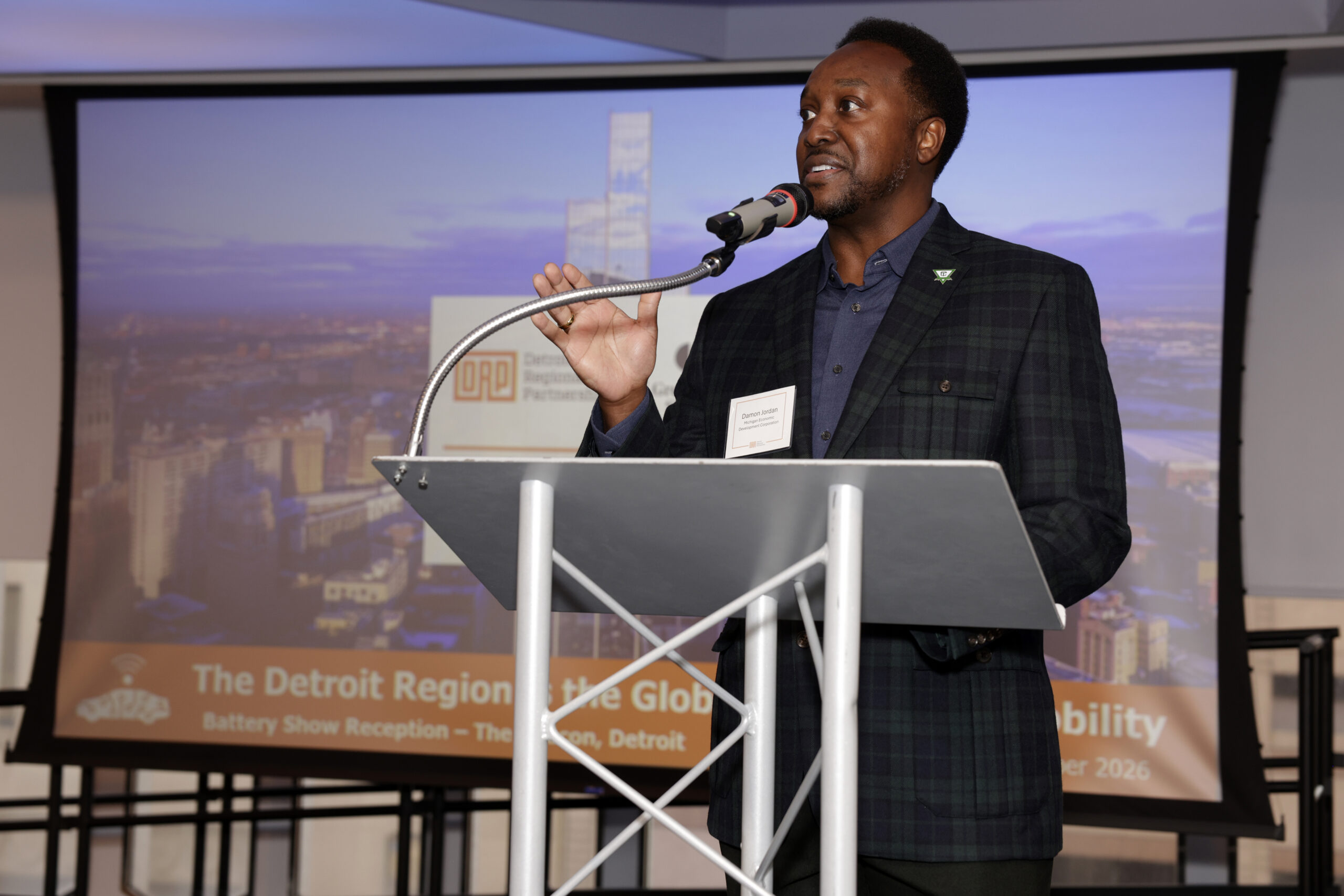 Man speaking at a podium